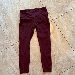 lululemon leggings Burgundy size 8, with pockets on legs, 23”